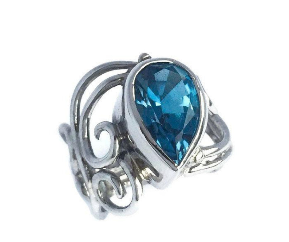 Ocean Inspired Custom Ring, A Journey in Palladium and Topaz