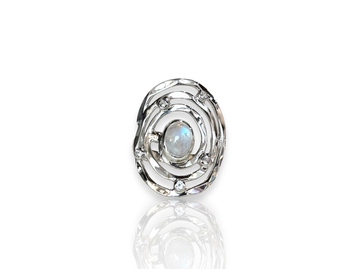 Side view of the silver Eye of the Storm ring showing the swirling setting