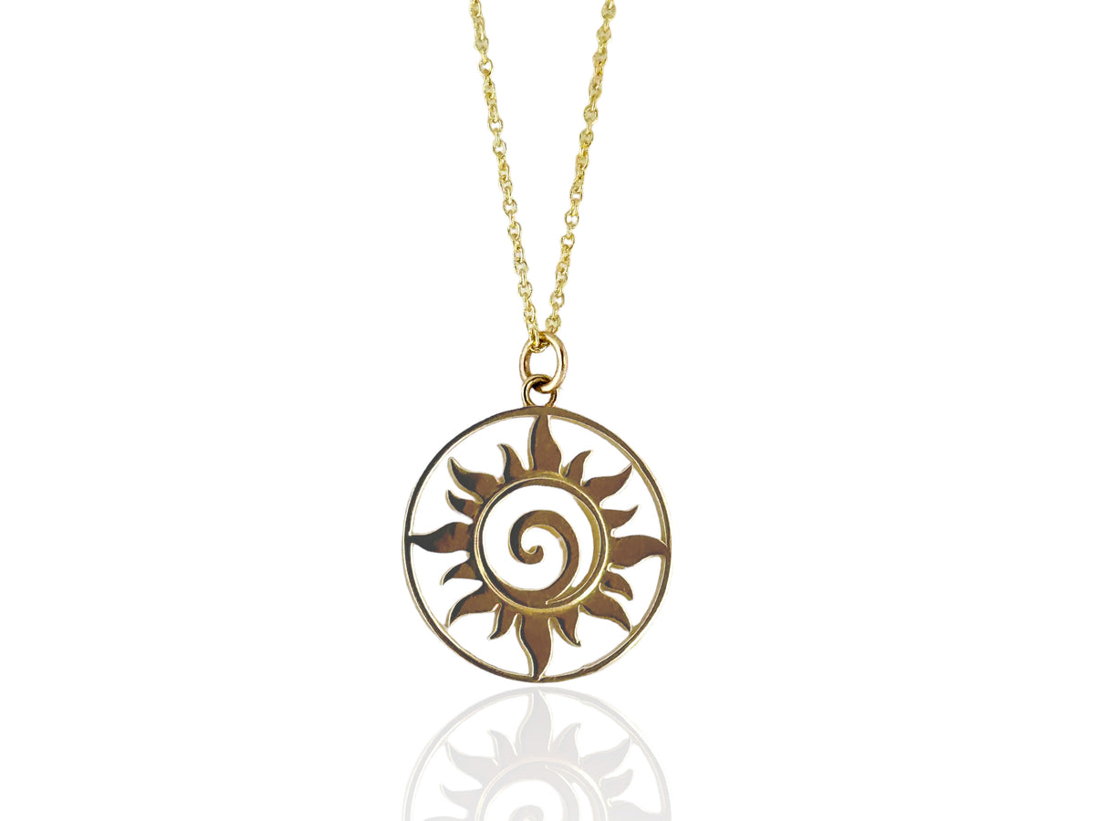 Small 14kt yellow gold sun medallion pendant radiating sun rays around a spiral center