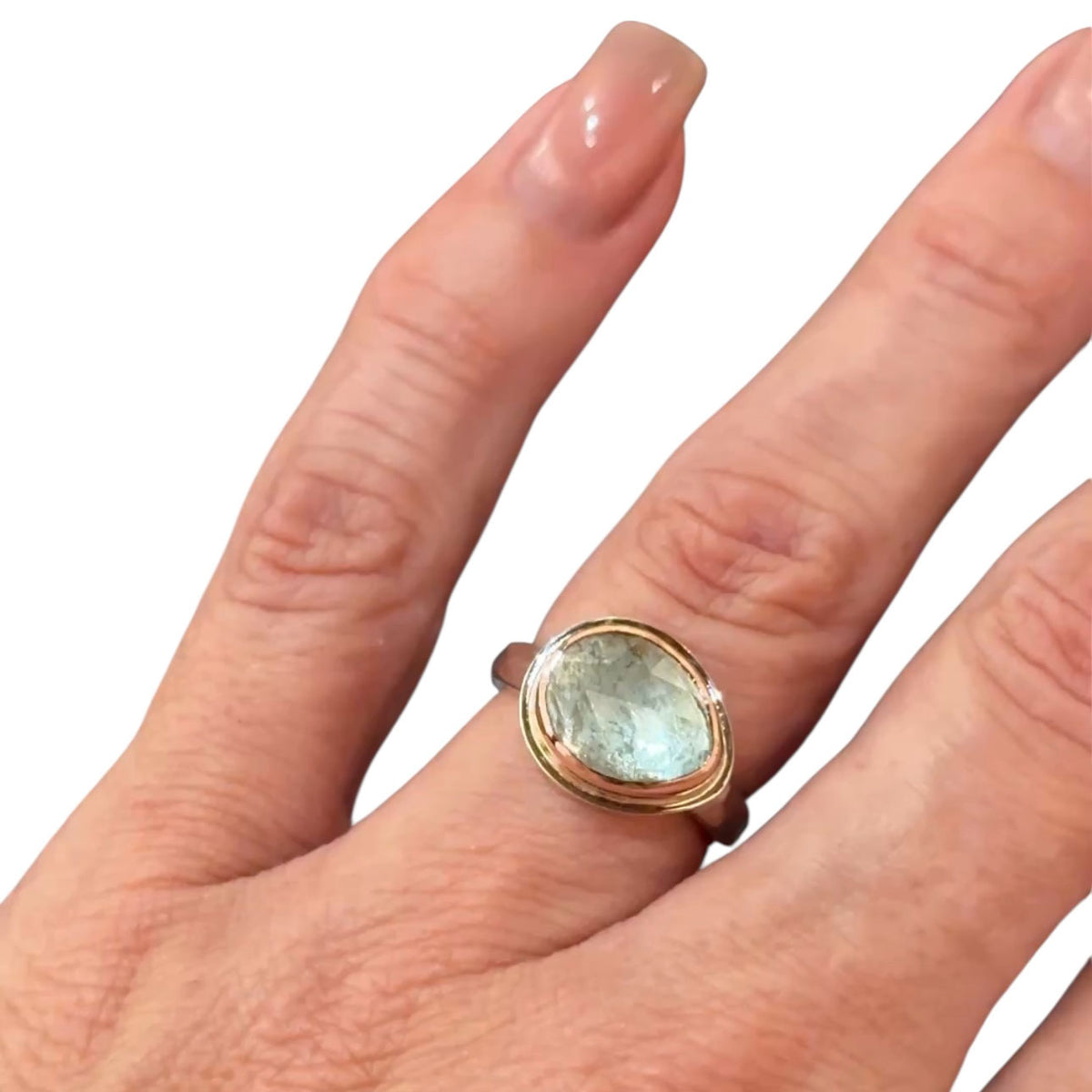 Side view of the rose-cut aquamarine ring showing the 3mm silver band