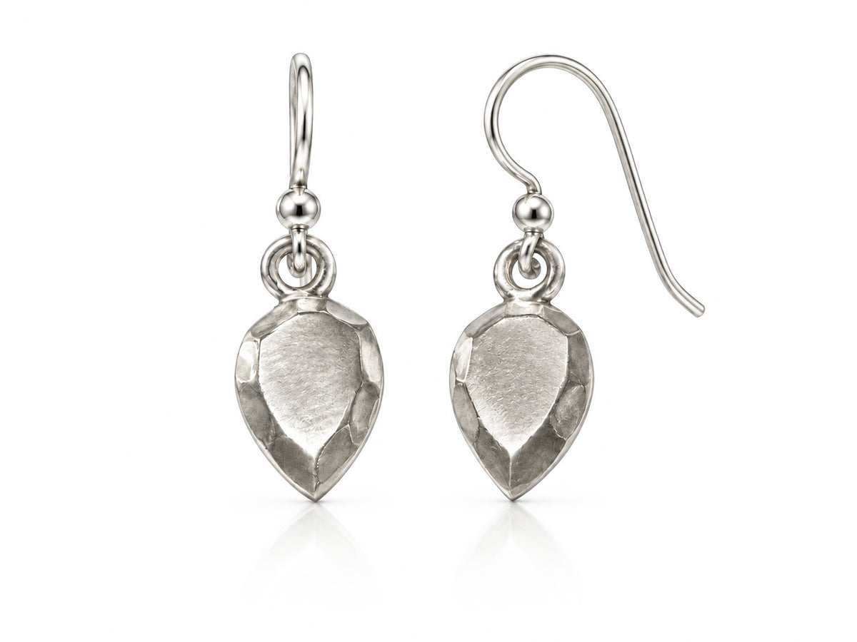 Sterling silver dangle earrings sculpted like pear-shaped faceted gems with brushed facets, on French wires