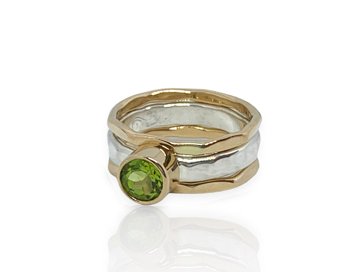 Side view of the three-band peridot Self Love ring