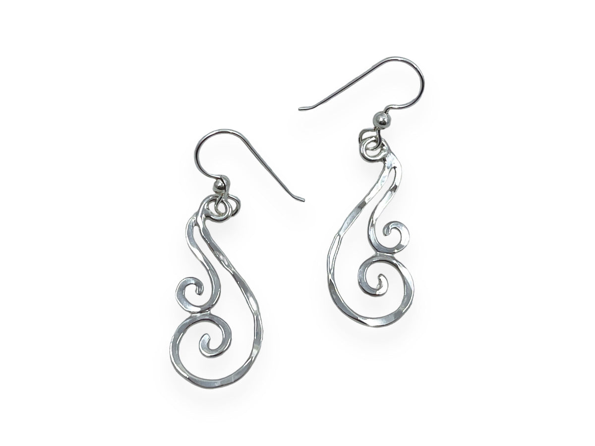 Another view of the signature hammered silver swirl earrings