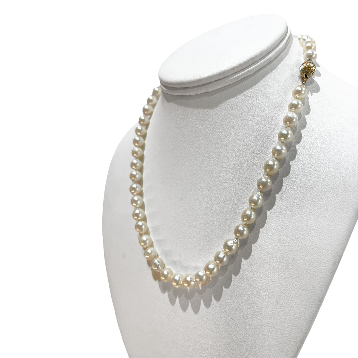 Another view of the classic white baroque pearl strand
