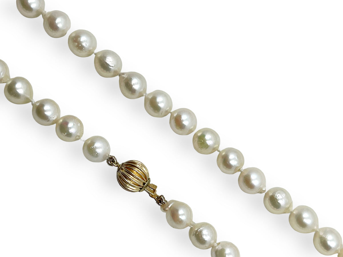 Close-up of the lustrous white baroque pearls