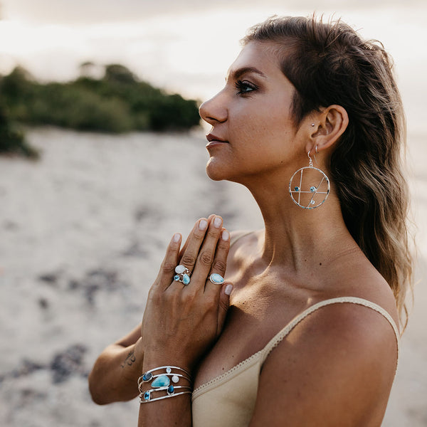 Blue topaz hoop earrings top