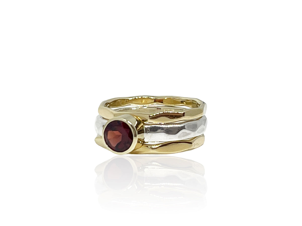 Alternate view of the red garnet gold and silver stack rings