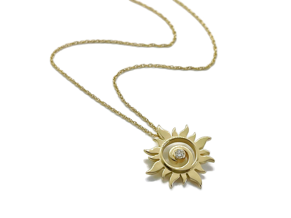 Alternate view of the gold sun swirl diamond pendant