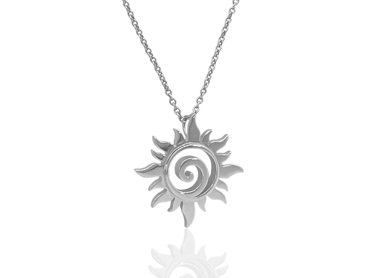 Small sterling silver sun pendant with swirling rays around a spiral center