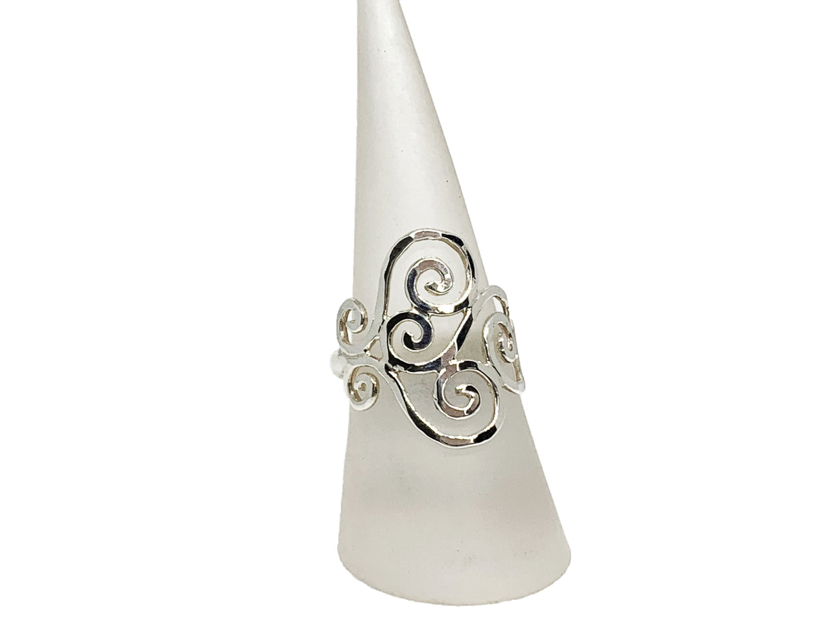Handcrafted sterling silver swirl ring with a hammered texture and mirror-shine finish