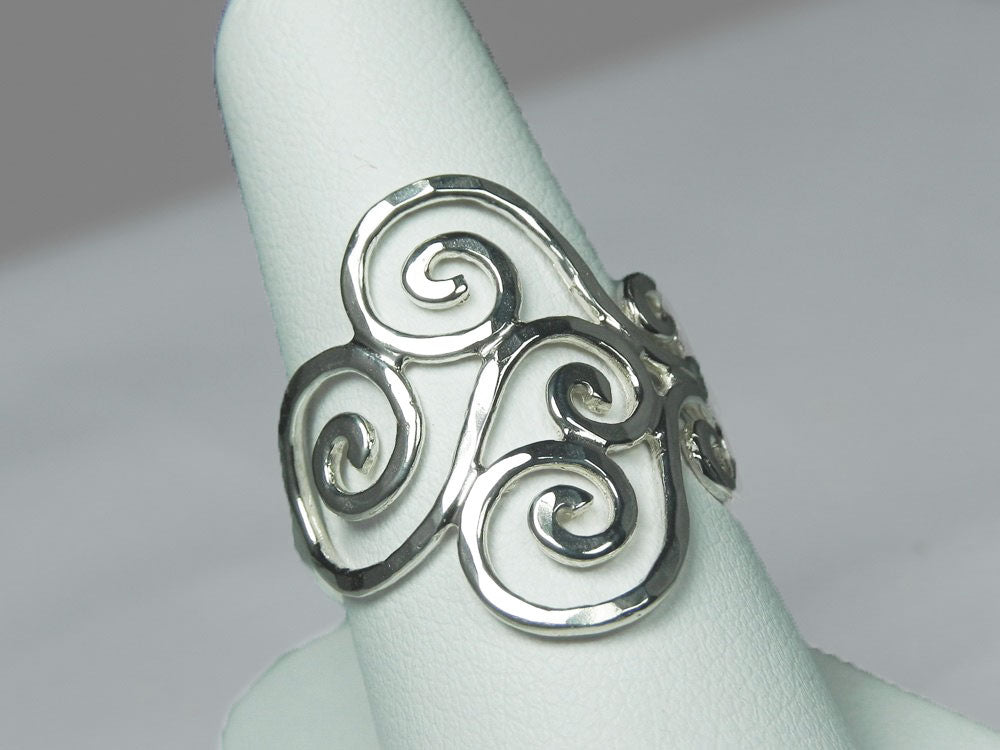 Top view of the spiraling sterling silver swirl ring