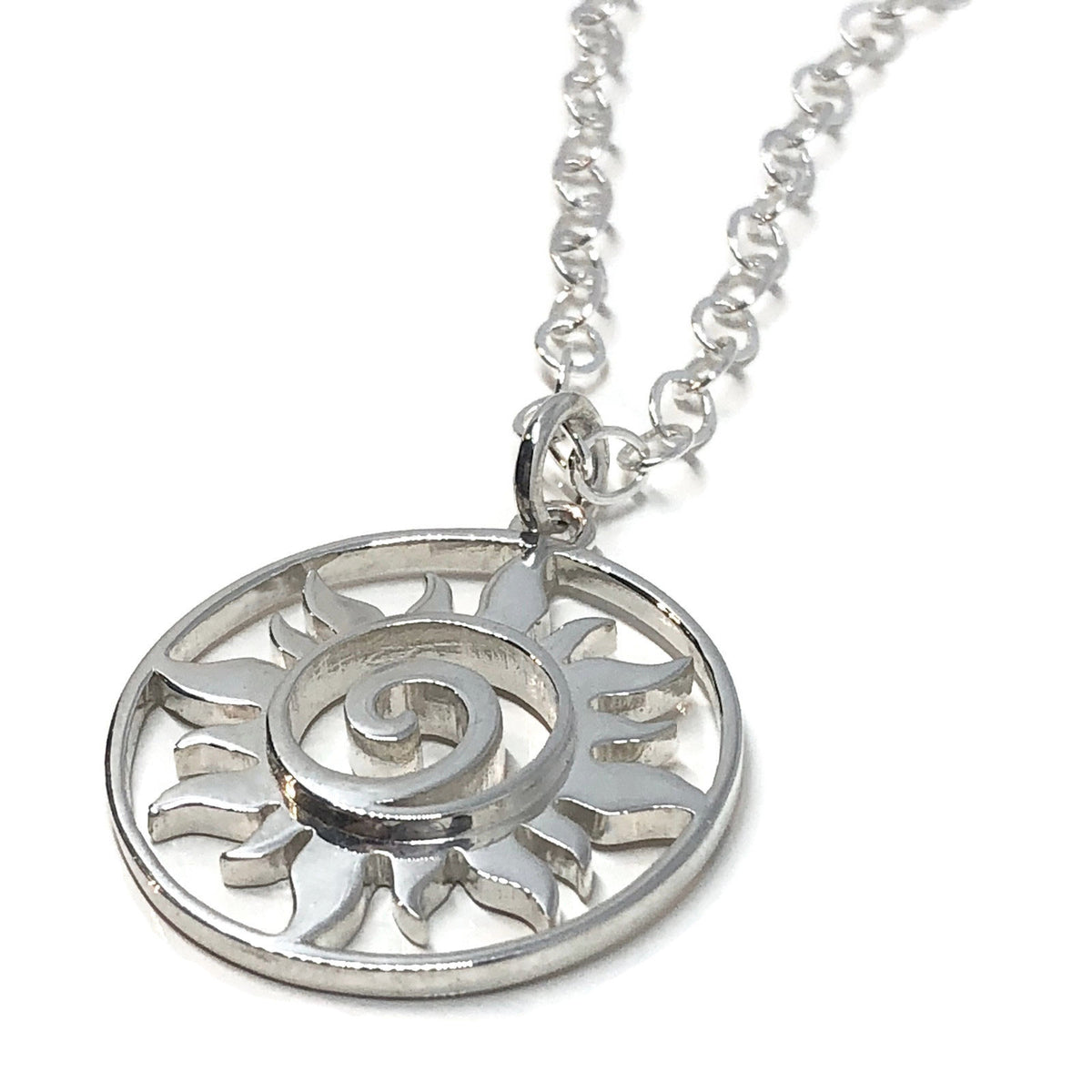 Sterling silver sun swirl medallion pendant with a solid silver loop around the sun's rays