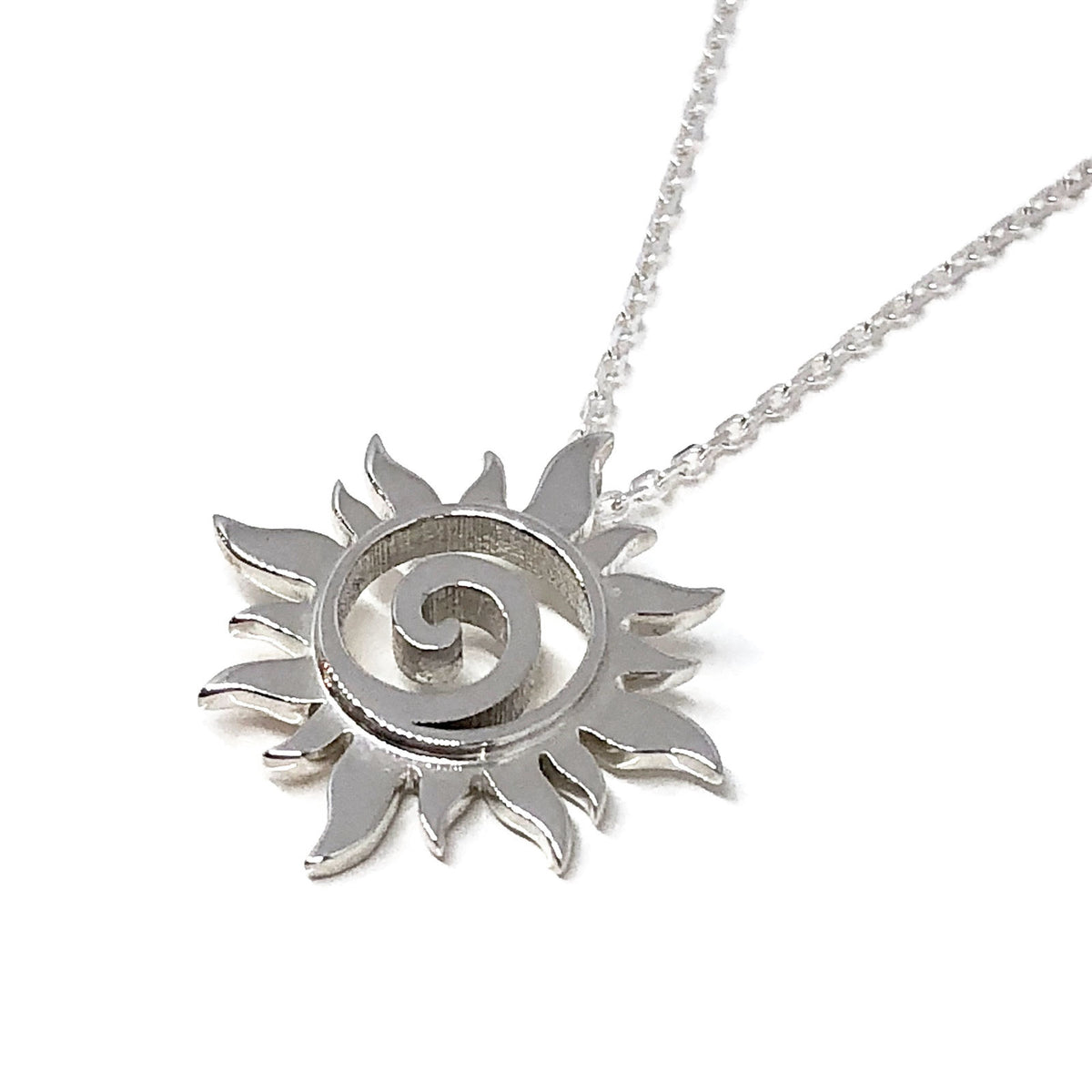 Alternate view of the small silver sun swirl pendant