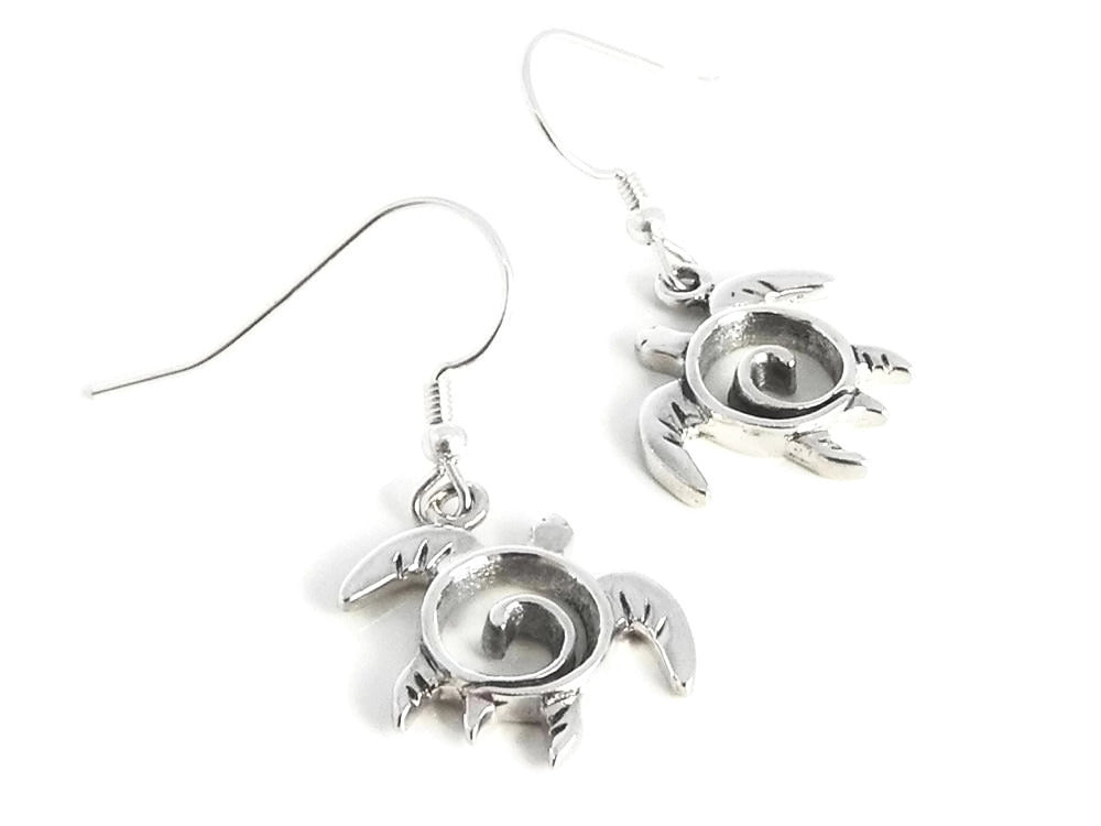 Sterling silver sea turtle dangle earrings with swirl details on French wire hooks