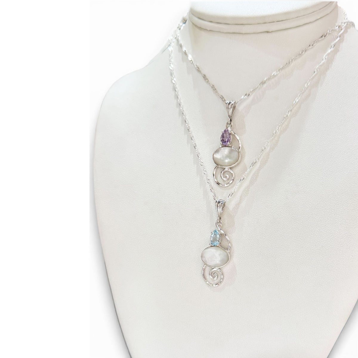 Mother of Pearl Silver Pendant with Blue Topaz