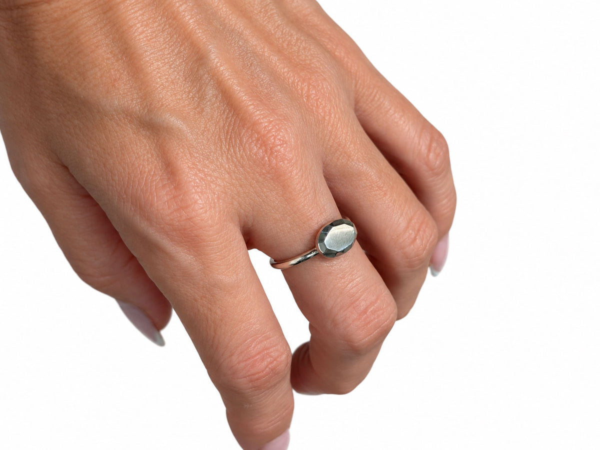Oval Shaped Sterling Silver Facets Ring