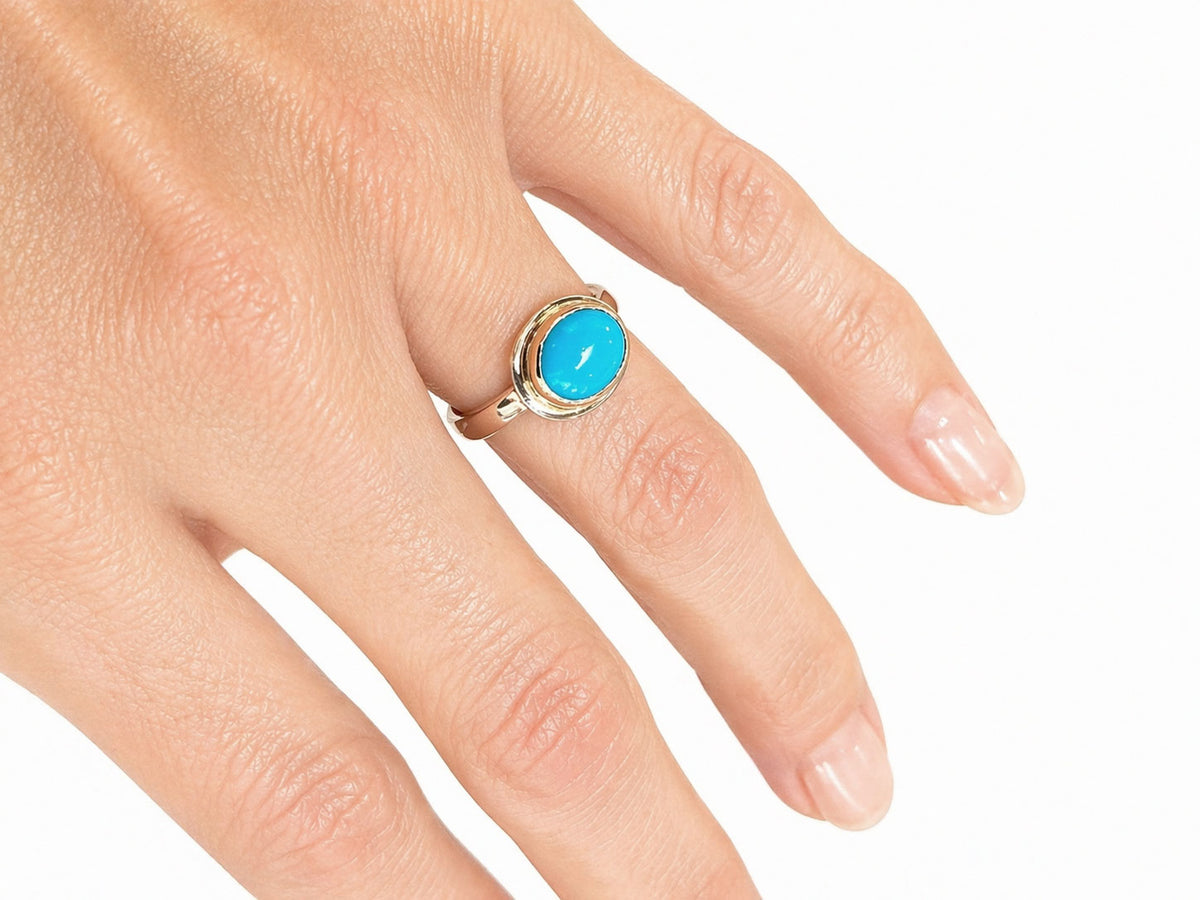 Sleeping Beauty Oval Turquoise Ring Silver and Gold