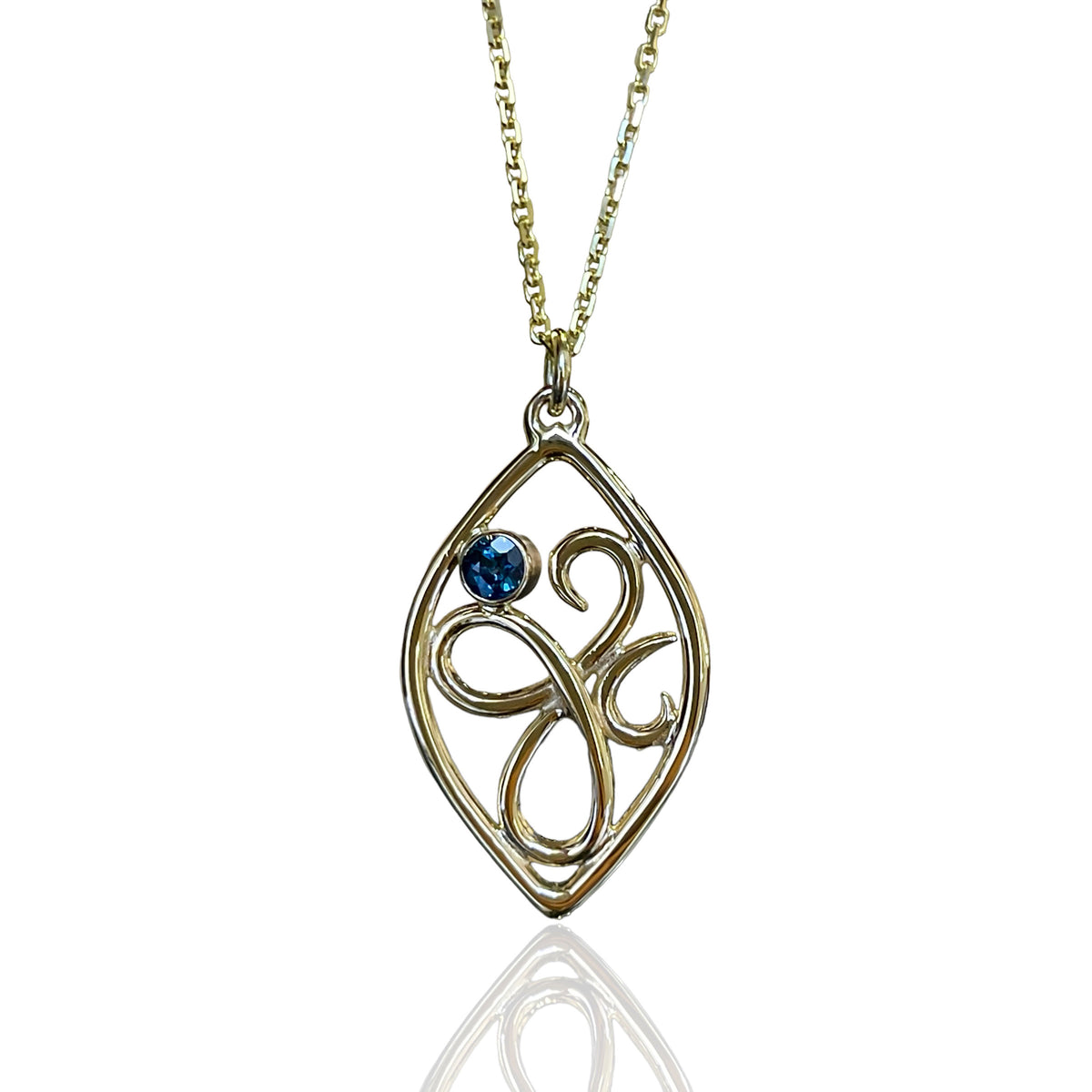 Marquise Swirl Gold Pendant with Blue Sapphire